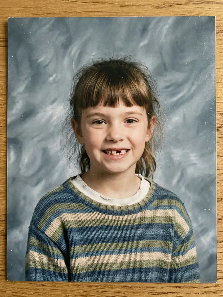 Slide 5: the real school picture, uneven bangs and a missing front tooth